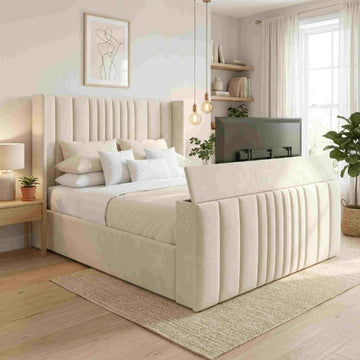TV bed vs wall-mounted TV — velvet TV bed with concealed footboard lift